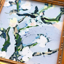 Load image into Gallery viewer, Detail of Nineveh Floral wall art showing textured canvas, white blossoms on blue background, and ornate gold frame.